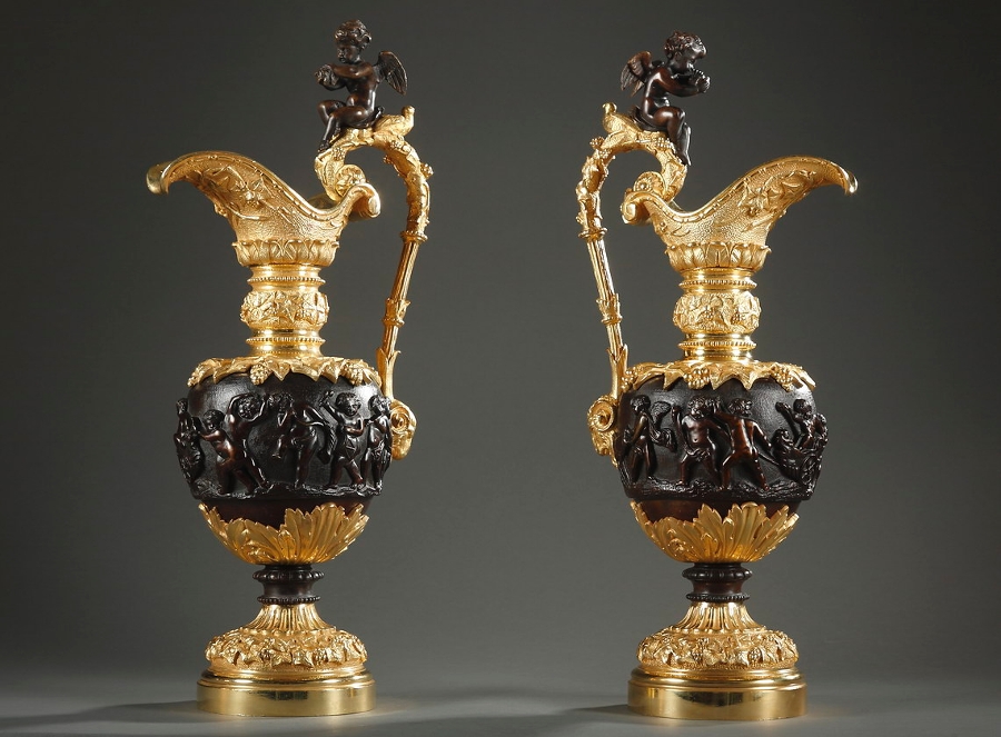 Napol?on III pair of ewers in bronze and ormolu with putti