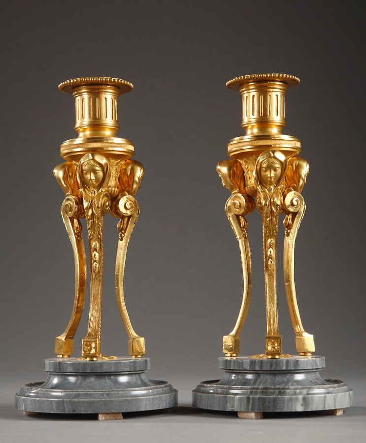 Pair of Small Gilt Bronze and Turquin Marble Candlesticks