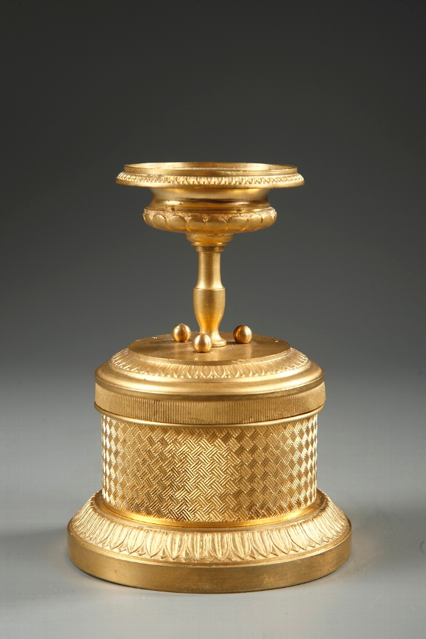 A tidy late 19th century gilded bronze inkwell