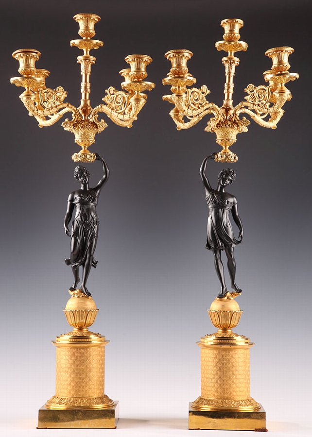 Pair of early 19th century French candelabra in gilded bronze and dark brown patina