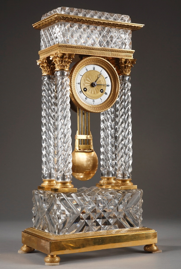 A Charles X cut-crystal and gilt bronze mantel clock