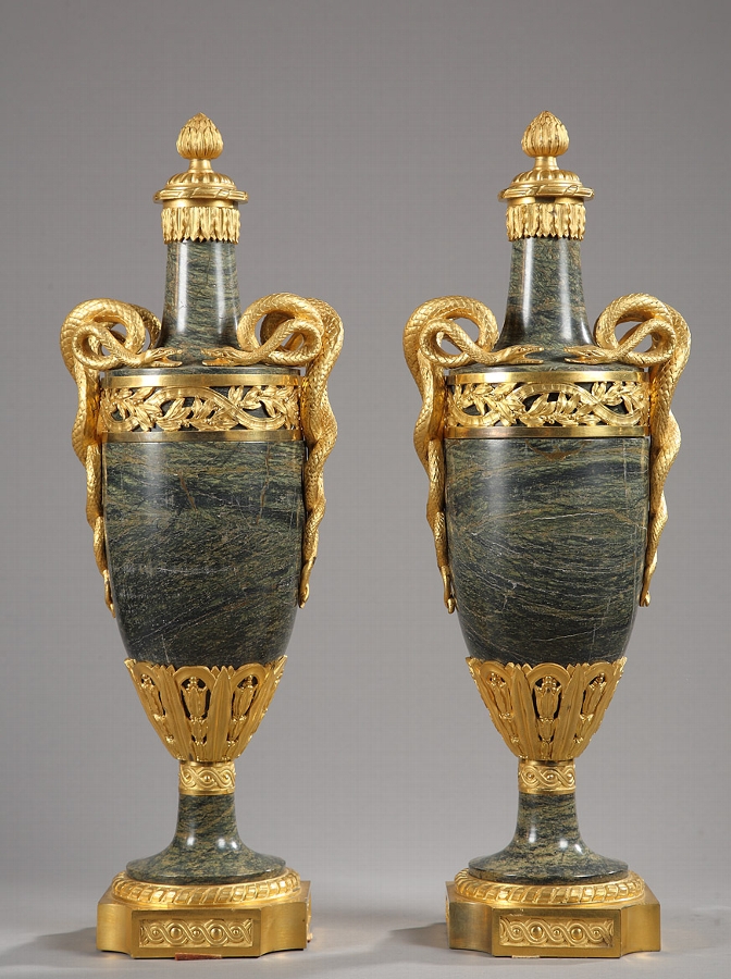 A late XIXth century pair of green marble and gilt bronze vases