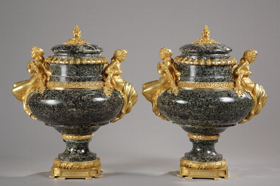 A Nineteenth century marble and gilt bronze pair of vases