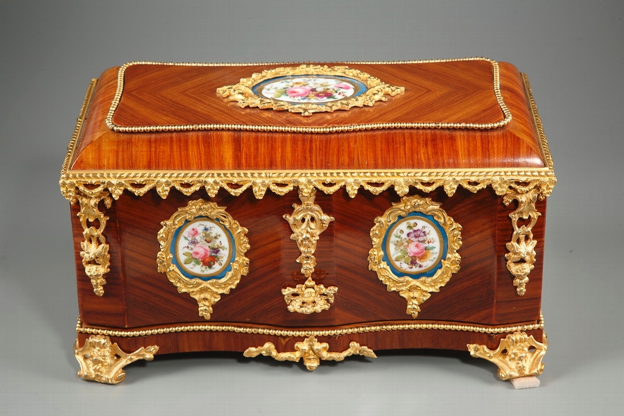 A 19th century casket in wood marquetry and porcelain plates signed Vervelle-Audot