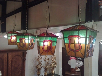 An interesting and colourful set of 4 leaded light lanterns c.1930