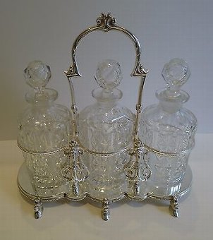 Antique Antique English Figural Tantalus in Silver Plate With Cut Crystal Decanters