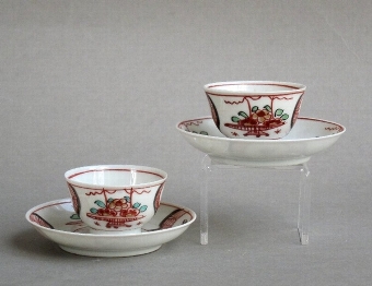 A pair of miniature Dutch-decorated Chinese export teabowls & saucers, Yongzheng or Qianlong