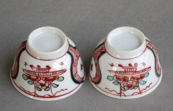 Antique A pair of miniature Dutch-decorated Chinese export teabowls & saucers, Yongzheng or Qianlong