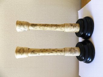 A pair of Meji late 19th century Japanese ivory candlesticks, 25cm high