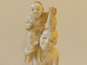 Antique A Japanese Ivory Okimono of a Fisherman Holding a Boy on his Shoulders c1890 Meiji Period 21cm High