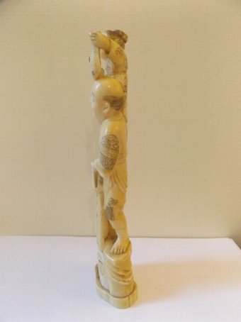 Antique A Japanese Ivory Okimono of a Fisherman Holding a Boy on his Shoulders c1890 Meiji Period 21cm High