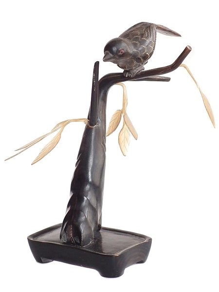 Chinese hand carved bird on a branch - ox horn