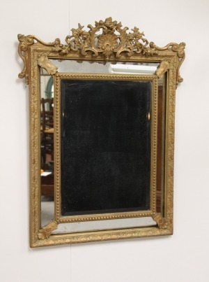 19thCentury French gilt cushion mirror