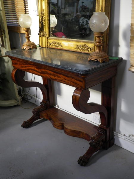 Mid 1800's mahogany console/side table, grey marble top and animal claw front feet  