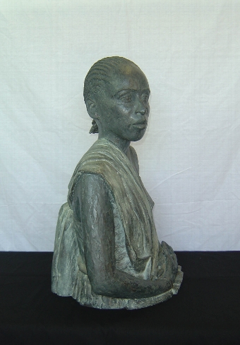 A Bronze Resin Bust of an African Lady