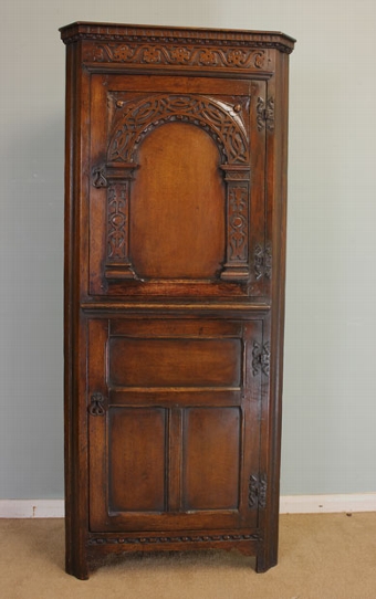 Antique Carved Oak Corner Cupboard.