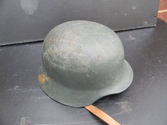 Antique German Helmet with liner and chin strap. 