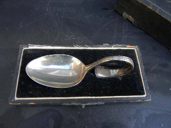 antique solid silver spoon childs first spoon comes in original box.