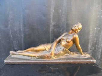 Semi Nude figure of reclining woman, item of quality. 