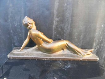 Antique Semi Nude figure of reclining woman, item of quality. 