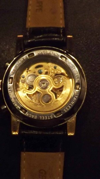 Antique Meridian Wristwatch rare automatic skeleton movement front and back 