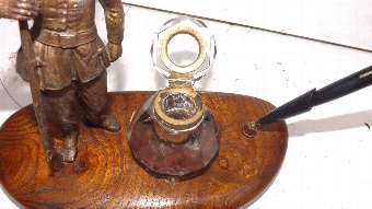Antique antique inkwell with military theme 