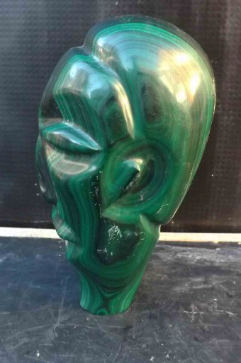 Antique easter island head in carved malachite stone 