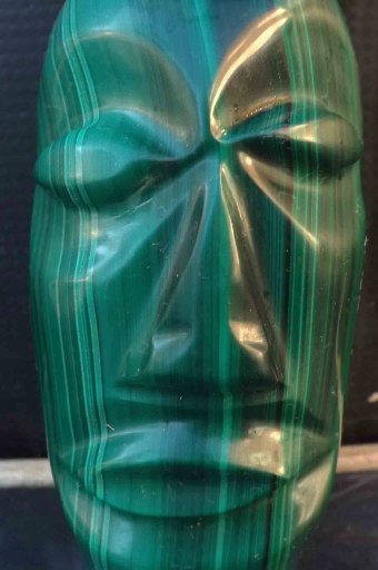 Antique easter island head in carved malachite stone 