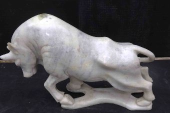 Spanish fighting Bull in white marble.