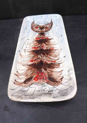 studio art pottery of a cat on a plaque