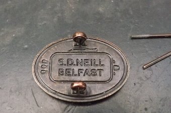 Antique Ulster lapel badge