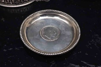 Antique pair of silver coasters 