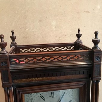 Antique Musical mahogany triple train on eight bells mantel clock