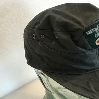 Antique German mountain troop soldier soft cap with badges