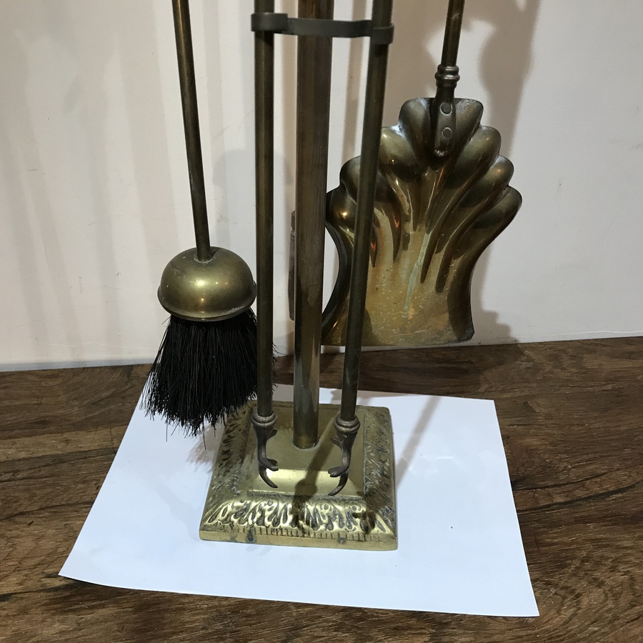 Antique Vintage fire ends set on stand in brass