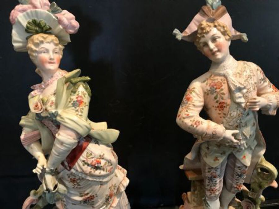 Antique Pair of  porcelain figures of Georgian dressed gentry.