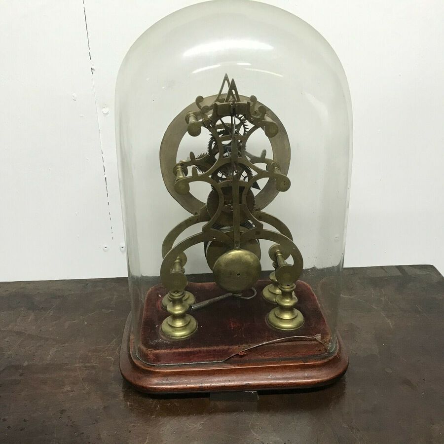 Antique Skeleton clock with glass dome