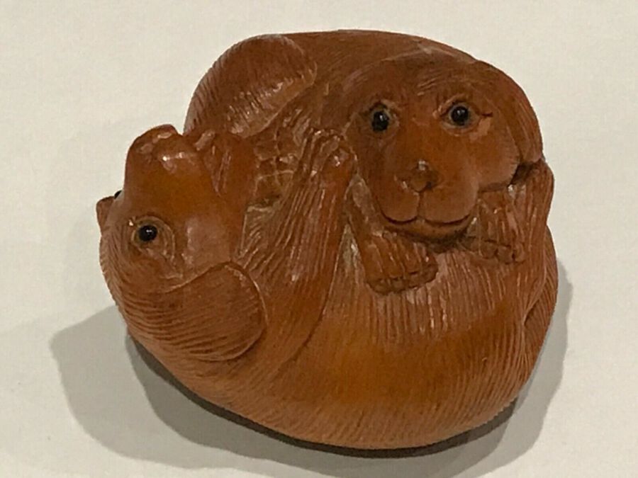 Netsuke wonderfully carved pair of playful puppies