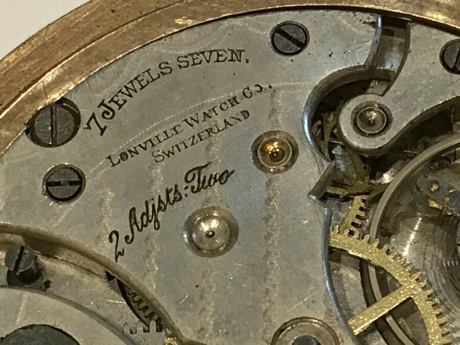 Antique Lonvillc Swiss open faced pocket watch