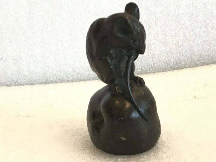 Antique Mouse on a shell biting his tail in bronze japanese