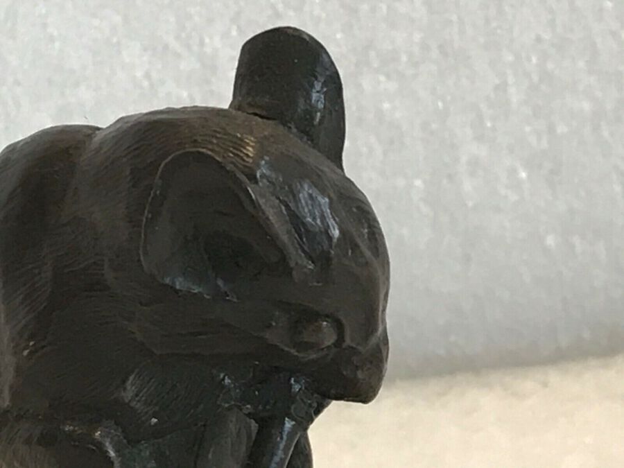 Antique Mouse on a shell biting his tail in bronze japanese