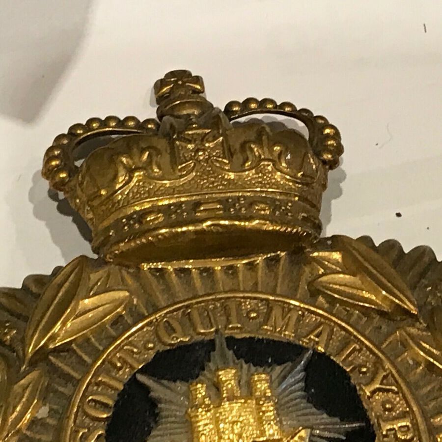 Antique British army cap badge