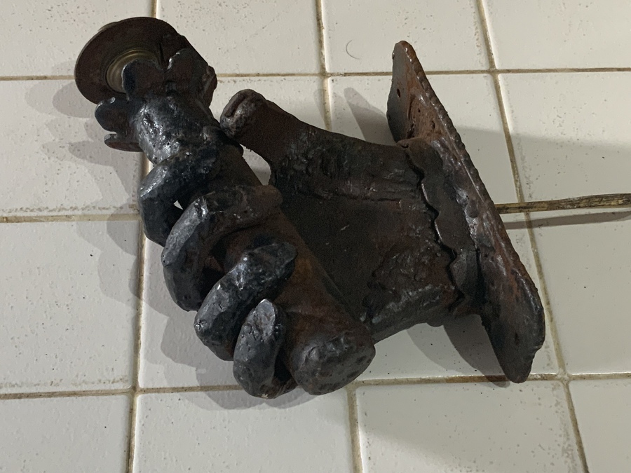 Antique Wrought iron hand holding a spills converted to electric