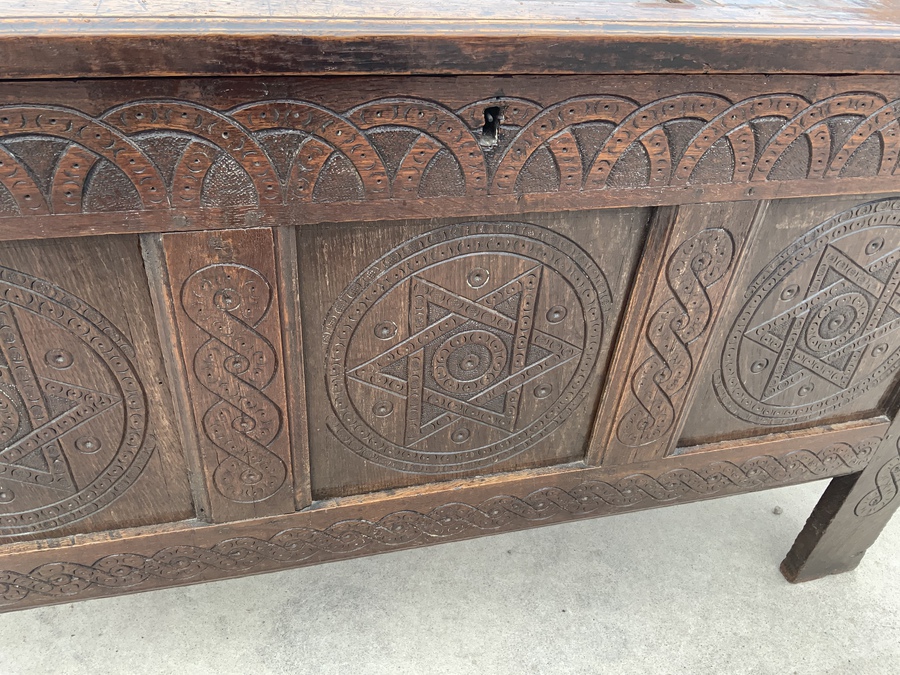 Antique Coffer in oak and superbly carved front, circa 1740’s