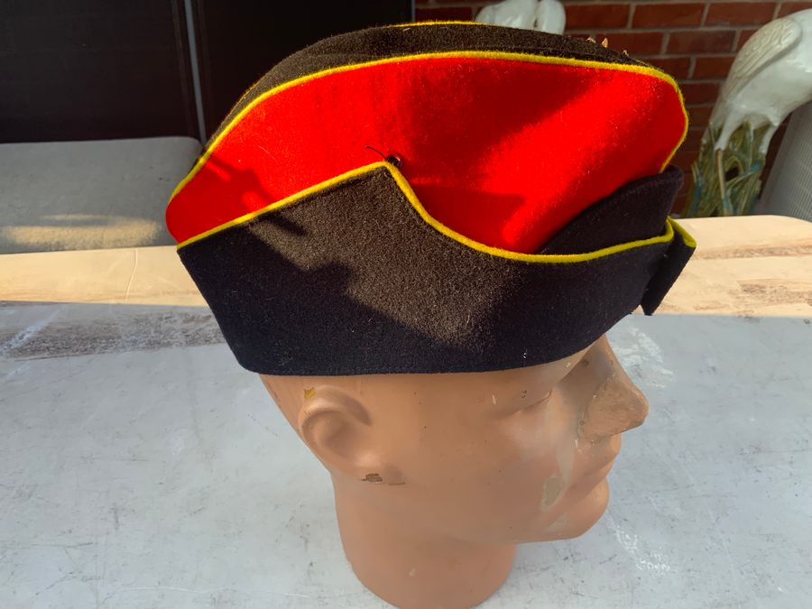 Antique British Hussars peaked cap and Badge