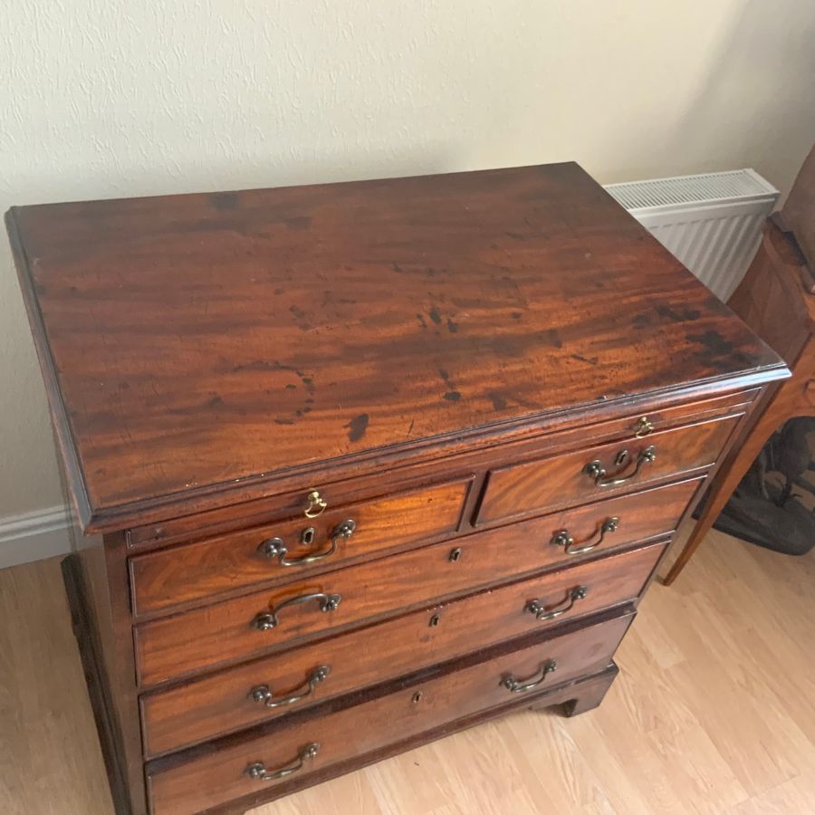 Antique George 11 Brush slide mahogany chest of drawers.