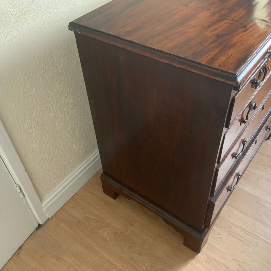 Antique George 11 Brush slide mahogany chest of drawers.
