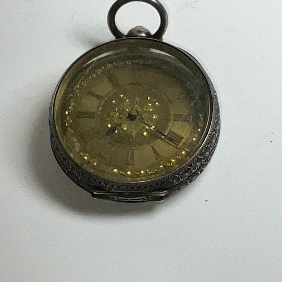 Silver pocket watch working