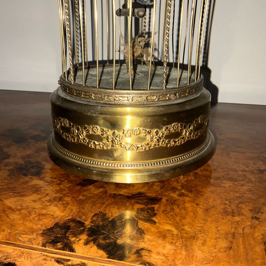 Antique AUTOMATON SINGING BIRD IN A GILDED CAGE.