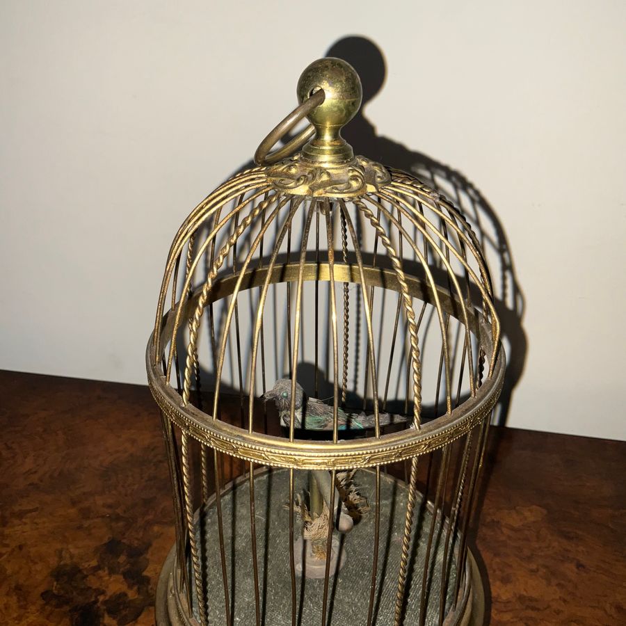 Antique AUTOMATON SINGING BIRD IN A GILDED CAGE.